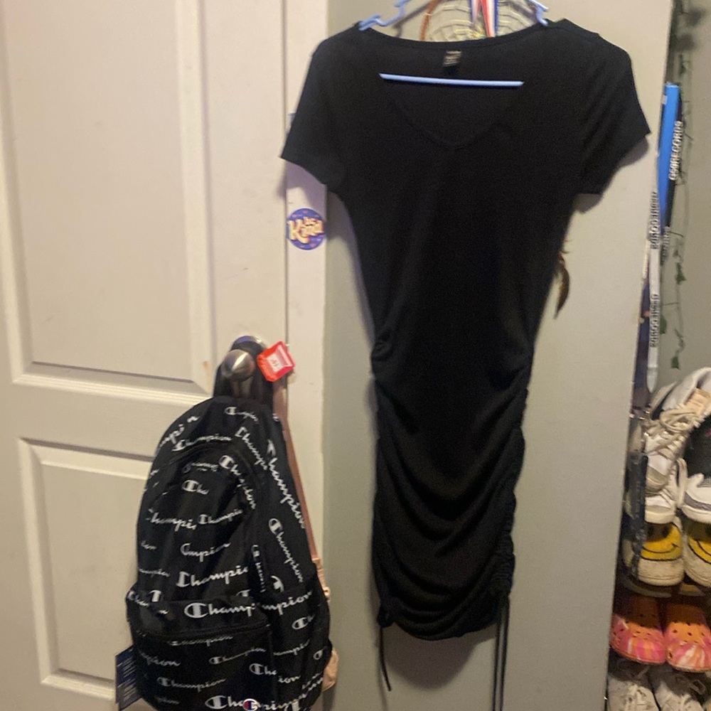 Dress it is small on the bottom for shaping ur curve. Or to tie up